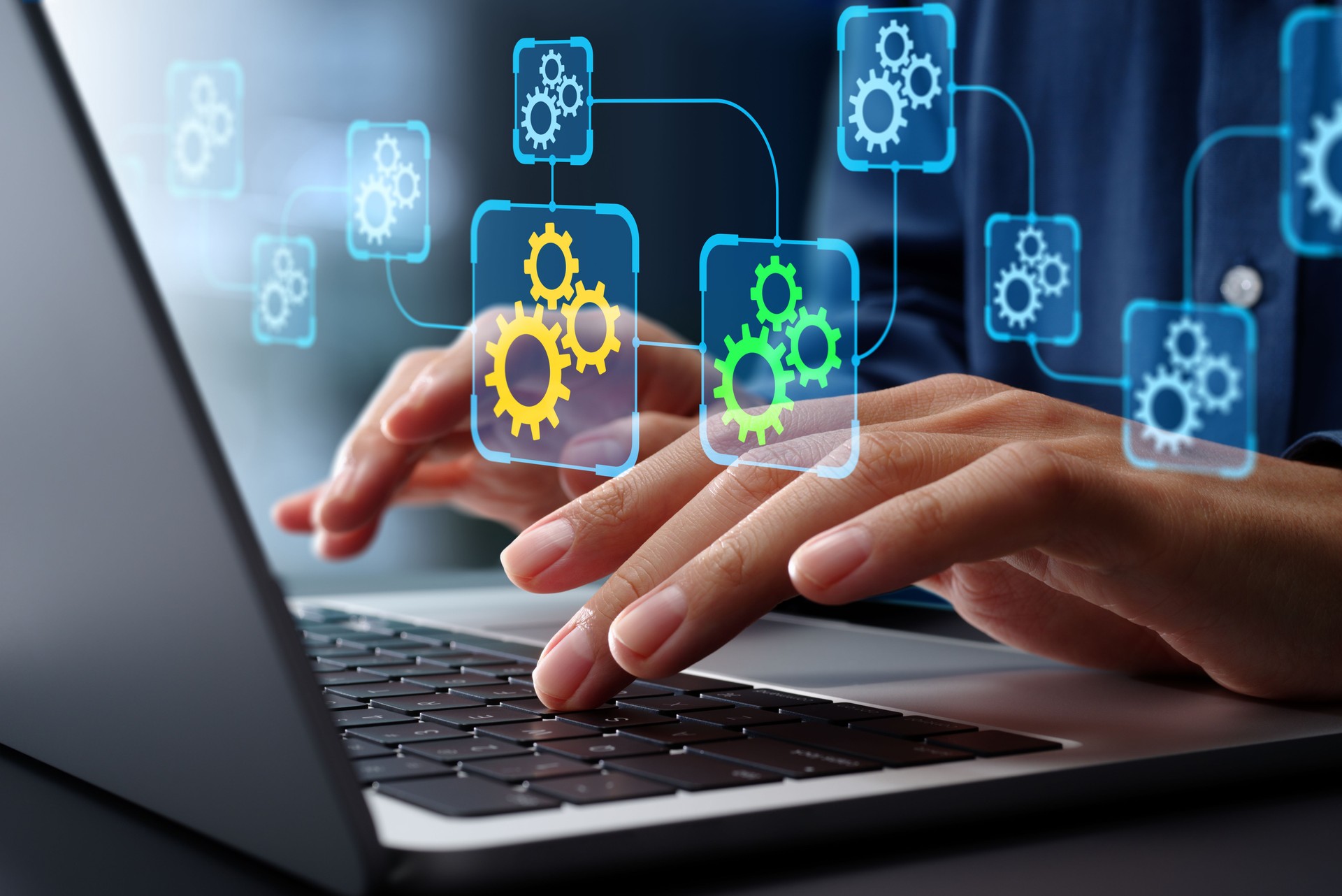 API automation and data transfer through system integration. Business Process Automation BPA technologies. Engineer using laptop computer to manage automation tools.