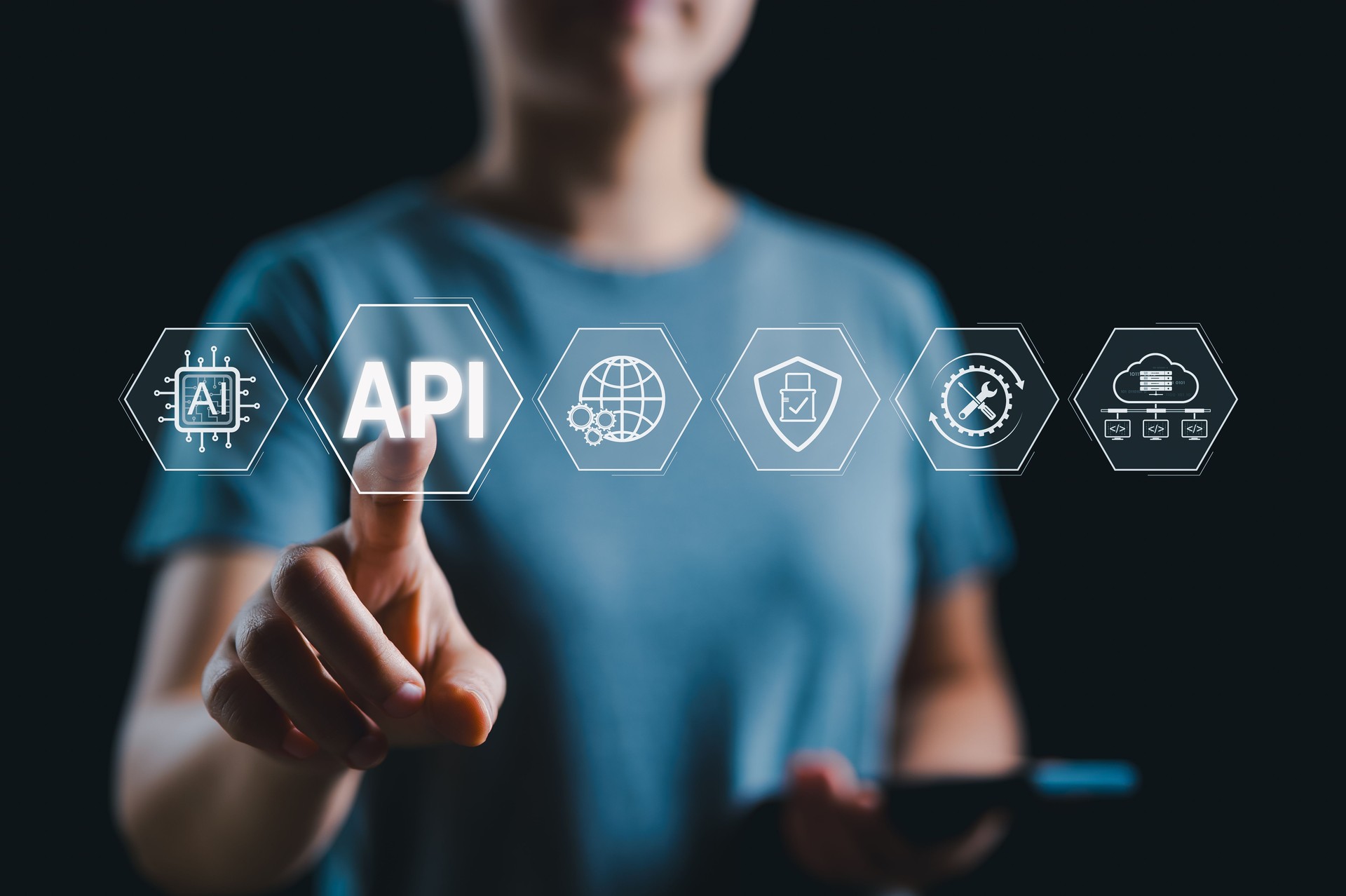 API, Application Programming Interface Concept. A person interacts with API icon, representing application programming interface integration, data access, automation, and system connectivity. API Key,